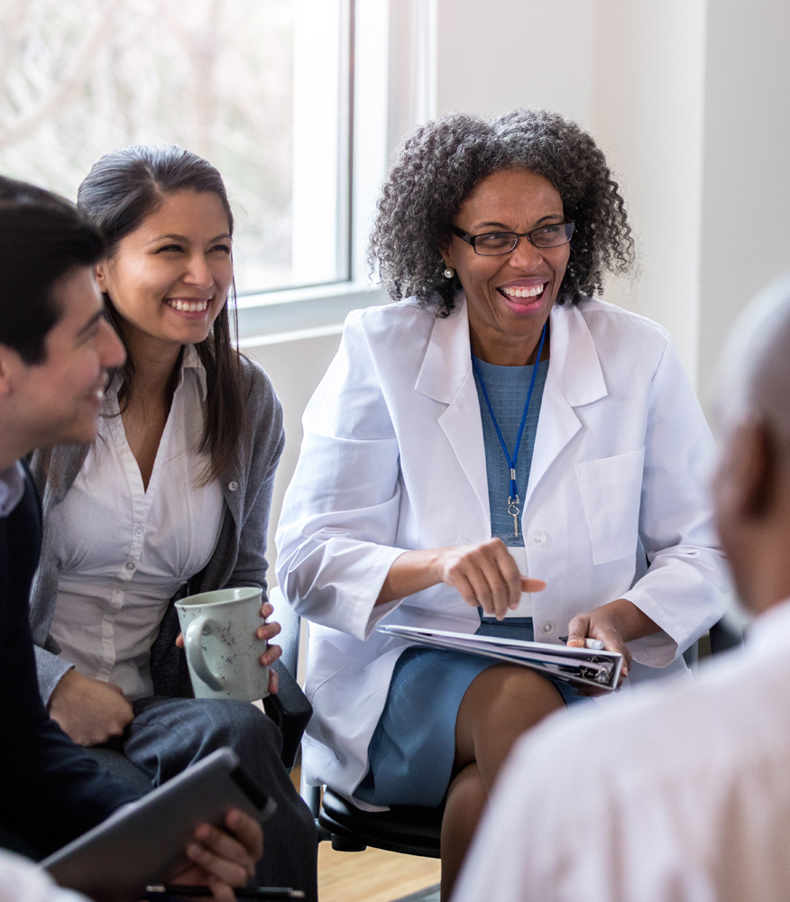 Group of medical professionals sharing insights and meeting together.